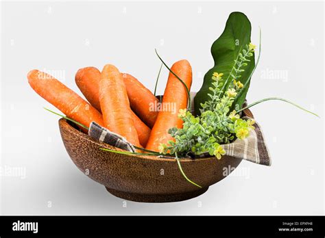 Carrots In Wooden Bowl Stock Photo Alamy