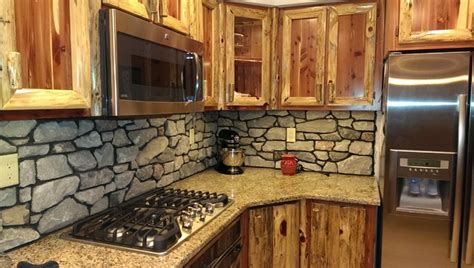 Rustic Red Cedar Kitchen With Cultured Stone Backsplash Rustico