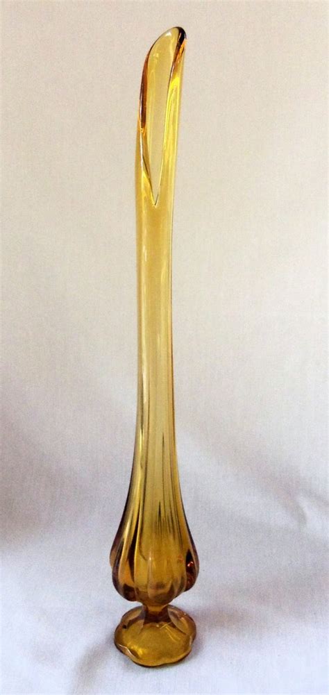 Items Similar To Mid Century Stretch Vase Amber Glass On Etsy