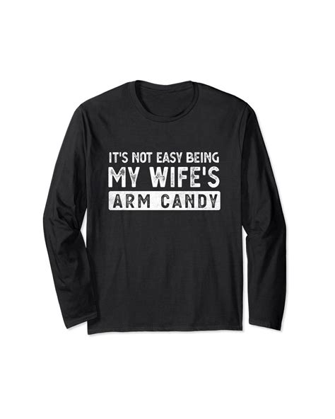 caterpillar it s not easy being my wife s arm candy but here i am nailin long sleeve t shirt in