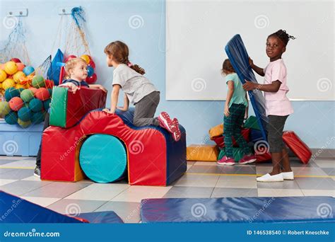 Group Of Kids Playing In The Daycare Stock Photo Image Of Sporty