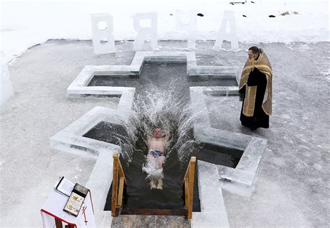 Epiphany Russian Orthodox Christians Plunge Into Frozen