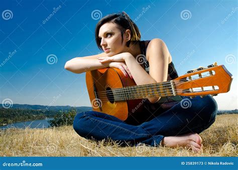 Female Guitarist Posing Outdoors Stock Image Image Of Performer