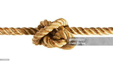 Tied Up Stress Knot Of Rope Or String Pulled Tight High Res Stock Photo