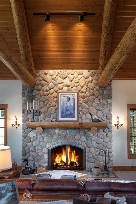 Custom Masonry Fireplace With River Rock Fireplace Supports Two Of The