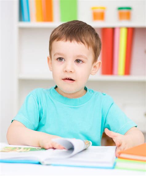 Little Boy Is Reading A Book Stock Image Image Of Educational