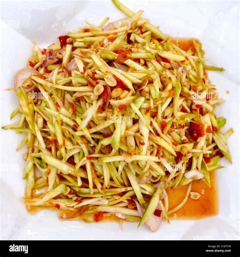 Thai Salad Mango Spicy Salad With Peanut Dressing Stock Photo Alamy