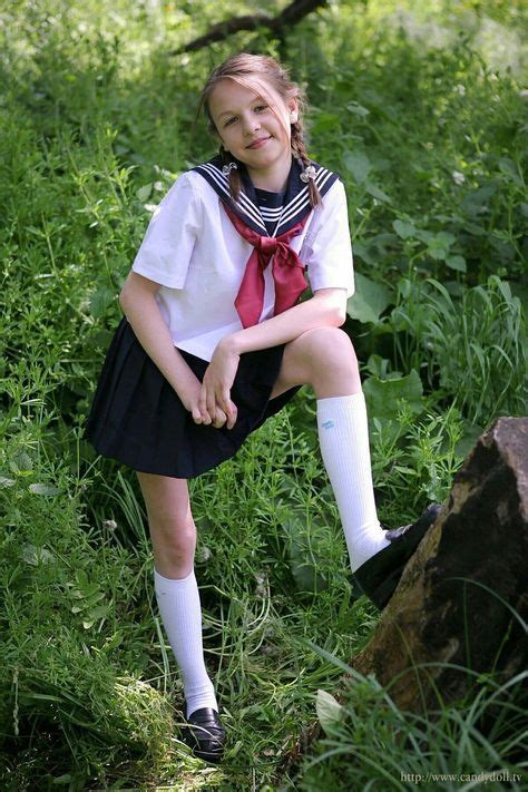 Preteen Schoolgirl In Uniform Hoodoo Wallpaper