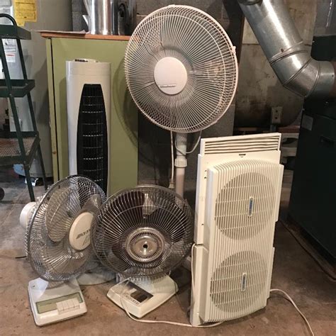 Lot 132 Four Oscillating Fans With Window Unit