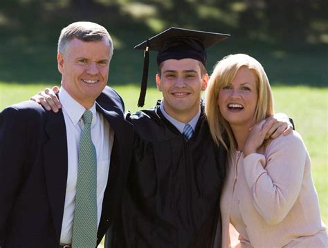 Parents At Graduation Celebrate Childs Last Accomplishment