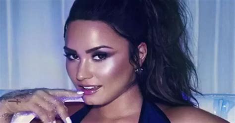 Demi Lovato Gets Wet And Wild In Plunging Swimsuit Daily Star