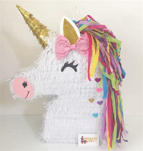 This diy unicorn piñata is a great addition to the party decor. Ready to Ship! Sale! Unicorn Pony Pinata with Pink Bow Gold Ear | Piñata de unicornio, Fiestas ...