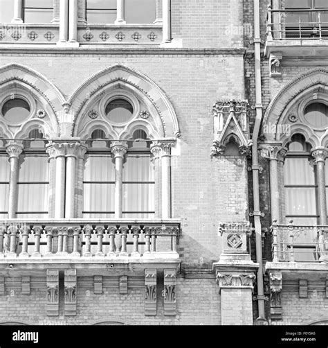 Old Architecture In London England Windows And Brick Exterior Wall