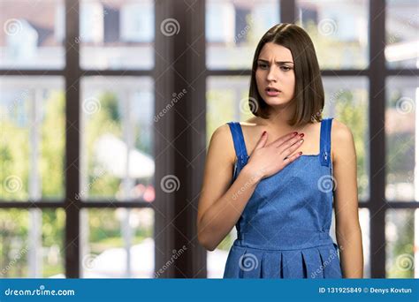 Young Unhappy Woman With Hand On Chest Stock Image Image Of Chest