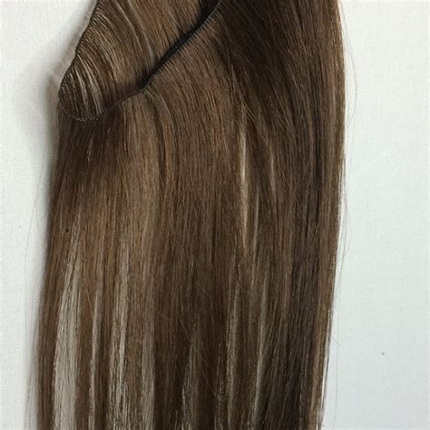 Get some lucious locks in an instant with these clip in hair extensions designed specifically for dark brown hair! Dark Brown Front Halo Hair Extension | Psykhe Hair Extensions