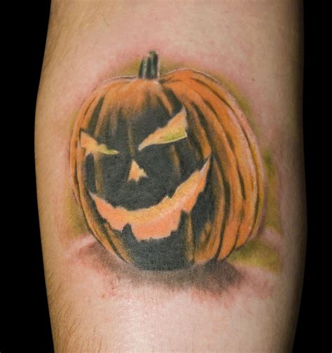 The 17 Spookiest Pumpkin Tattoos Tattoos Spooky Pumpkin Maple Leaf