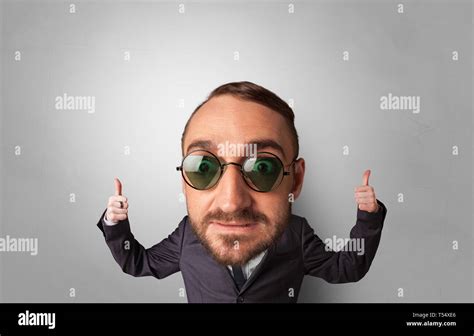 Big Head On Small Body With Copy Space Stock Photo Alamy