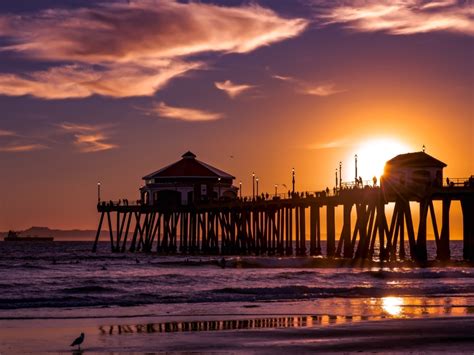 Vibrant Sunset Over Huntington Beach Pier Photo Of The Day Orange