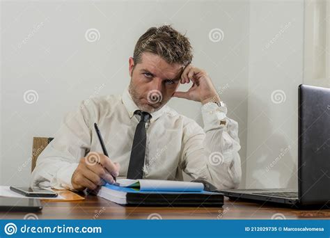 Upset And Depressed Businessman At Office Desk Young Unhappy Man
