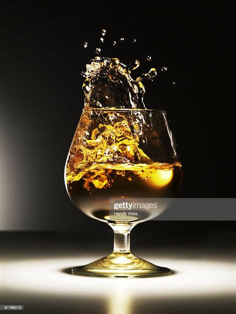 Cognac Splash High Res Stock Photo Getty Images