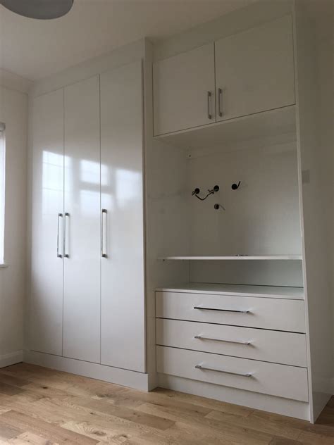 Click the image for larger image size and more details. the perfect solution for fitted wardrobes in a small room in London. Plenty of hanging space al ...