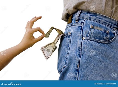 Pick Pocket Stealing Dollar Bills Out Of A Pocket Stock Photo