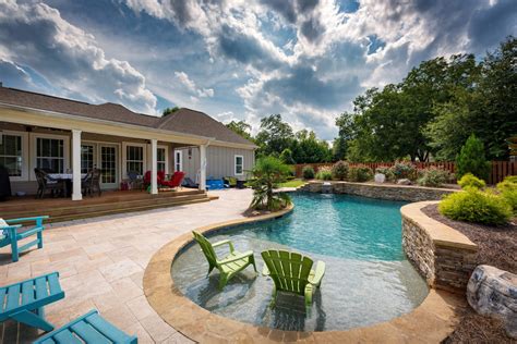 Custom Pool And Spa With Seating And Tanning Ledge Georgia Pools Peachtree City And Atlanta