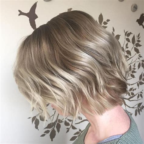 If i was paying a salon to do it for me then, in my opinion, it would not at all be worth it but since i do it all myself or diy then it is well worth my time :) so how to tone hair | brassy to ash blonde wella toner. Ash Blonde Bob with Layers | Hair styles, Hair do for medium hair, Short blonde hair