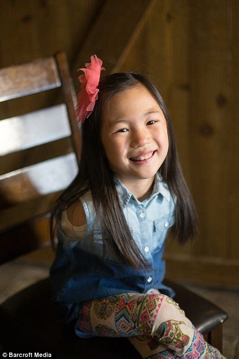 meet the remarkable seven year old utah girl born without arms who eats writes and even washes