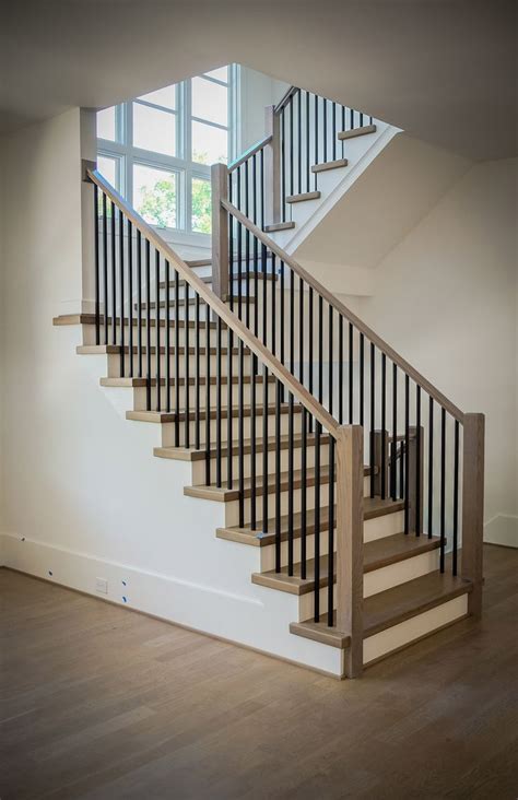 Popular indoor railing projects include replacing worn out wood spindles with beautiful iron balusters as well as taking out your wood banister completely and doing an all metal or iron railing. Metal Baluster System in 2020 | Stair railing design ...