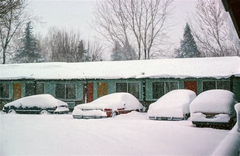 Free Vintage Stock Photo Of Cars Covered With Snow Outside A Motel Vsp
