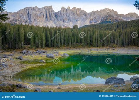 Karersee Or Lago Di Carezza Is A Lake With Mountain Range Of The