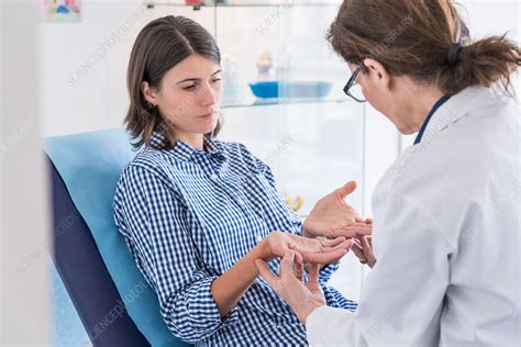 Doctor Examining Hands Of A Patient Stock Image C0401283 Science