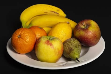 Bananas And Oranges In A Black Bowl Close Up Stock Photo Image Of