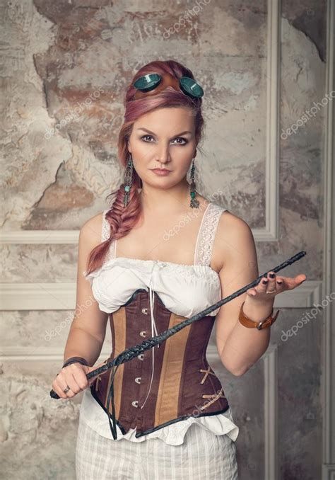 Hermosa mujer steampunk con látigo fotografía de stock DarkBird