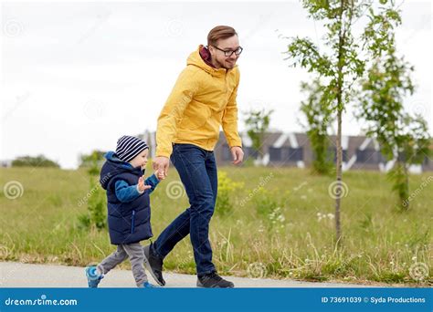 Happy Father And Little Son Walking Outdoors Stock Image Image Of