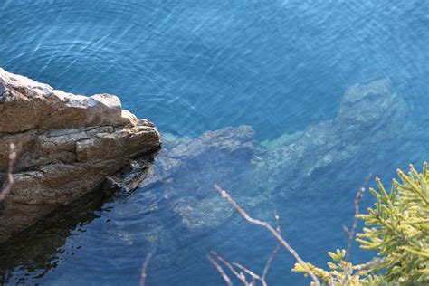 Free Images Sea Coast Water Nature Rock Ocean Shore Wave Lake Cliff Reflection Bay