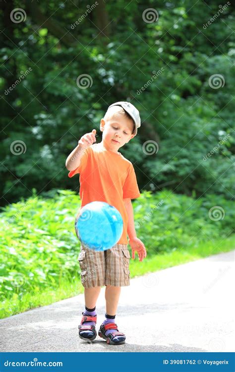 Boy Playing With Ball In Park Outdoors Stock Photo Image Of Sport