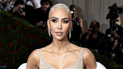 kim kardashian shows off major cleavage in tight top and looks unrecognizable in new video the