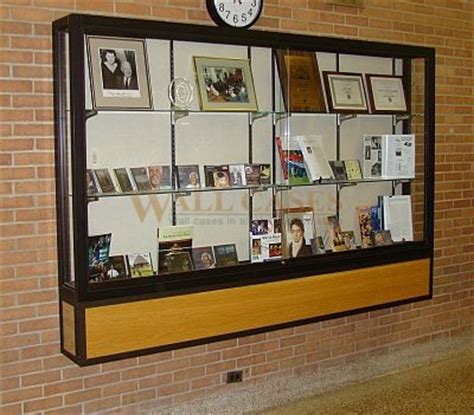 The open panel of shelves at the side is convenient for displaying the books and showpieces. Wall Mounted Display Cases - Made in the USA ...