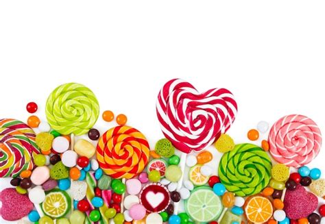 Premium Photo Colorful Candies And Lollipops Top View