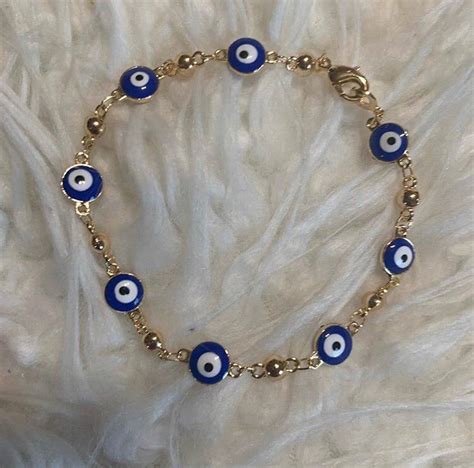 Blue Evil Eye Bracelet On Mercari In 2020 Evil Eye Bracelet Blue