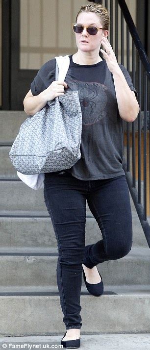 Drew Barrymore Displays Her Curves In Flattering Skinny Jeans As She