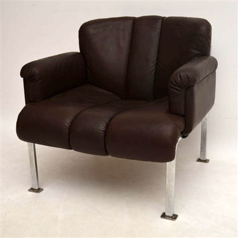 Could anyone please help me identify the makers of the chair? Pair of Retro Leather & Chrome Armchairs by Girsberger ...