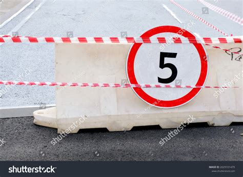 Fivekilometer Speed Limit Sign Hanging On Stock Photo 2029101479