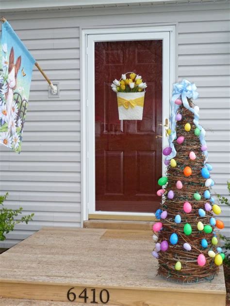 Brush decoupage medium onto the back of a paper strip and apply to an egg, smoothing out the excess glue and air bubbles; 20 Fresh And Cute Easter Porch Décor Ideas - Shelterness