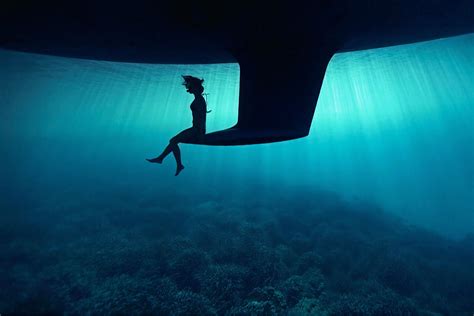 Just A Girl Sitting On The Keel Of A Boat Underwater Enhanced Rpics