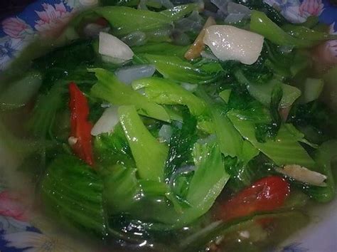 Cicipi tekstur sayur, jangan masak hingga terlalu empuk. Resep dan Cara Membuat Sayur Sawi Hijau Kuah Bening yang ...