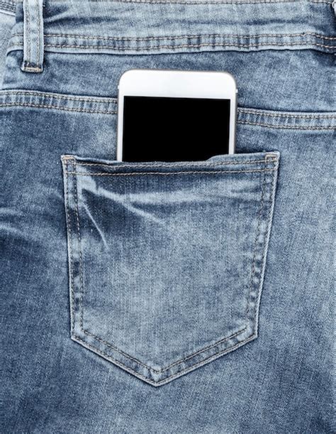 Premium Photo White Smartphone In The Back Pocket Of Blue Jeans Full
