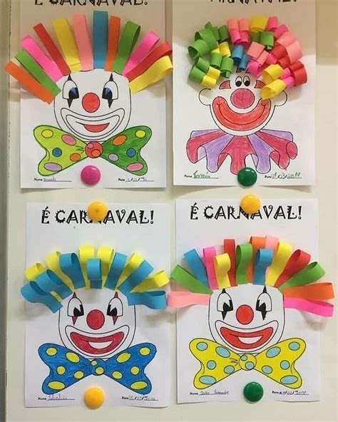 Three Clowns Made Out Of Paper And Colored Pom Poms On The Wall